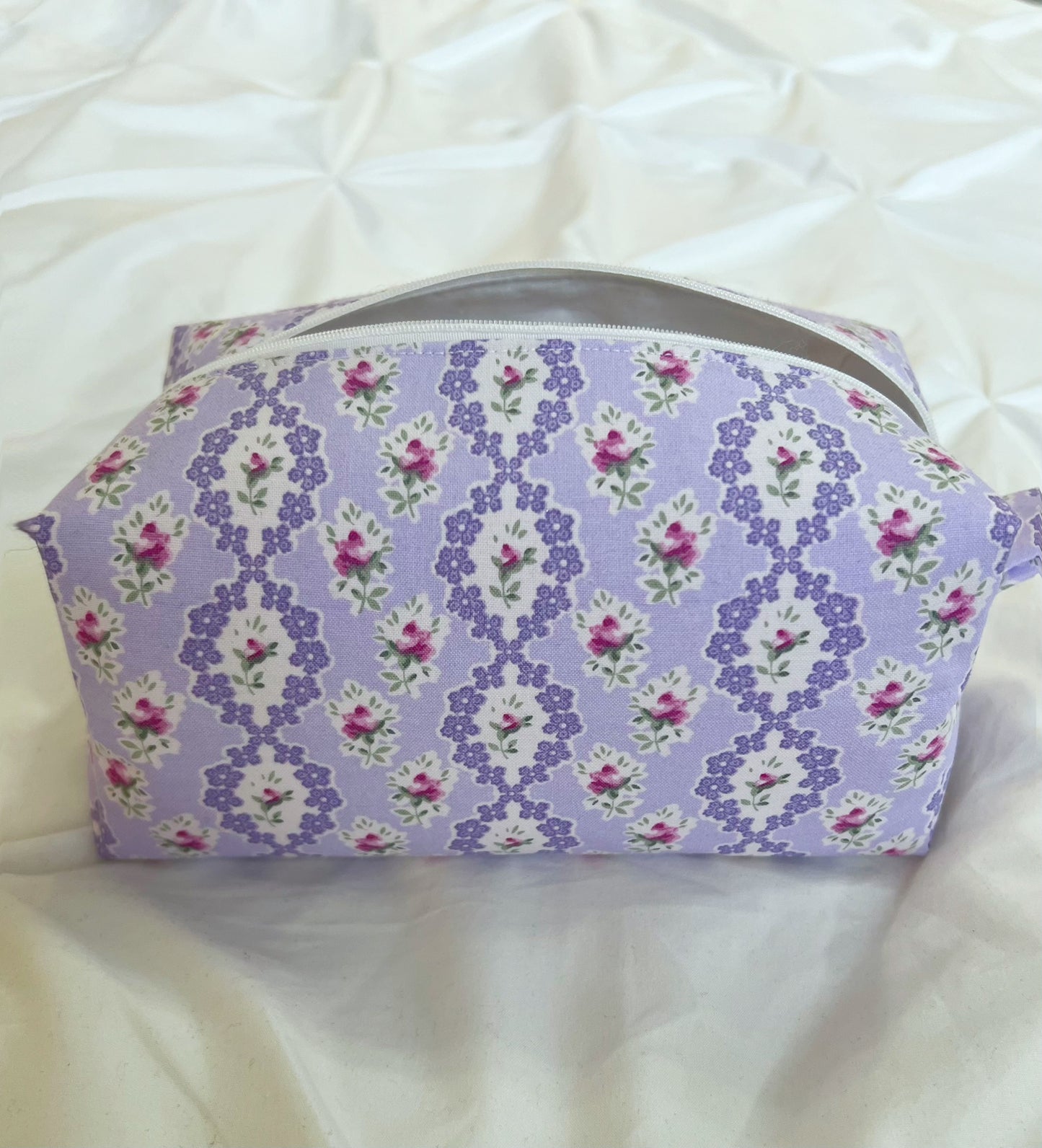 Purple floral coquette makeup bag