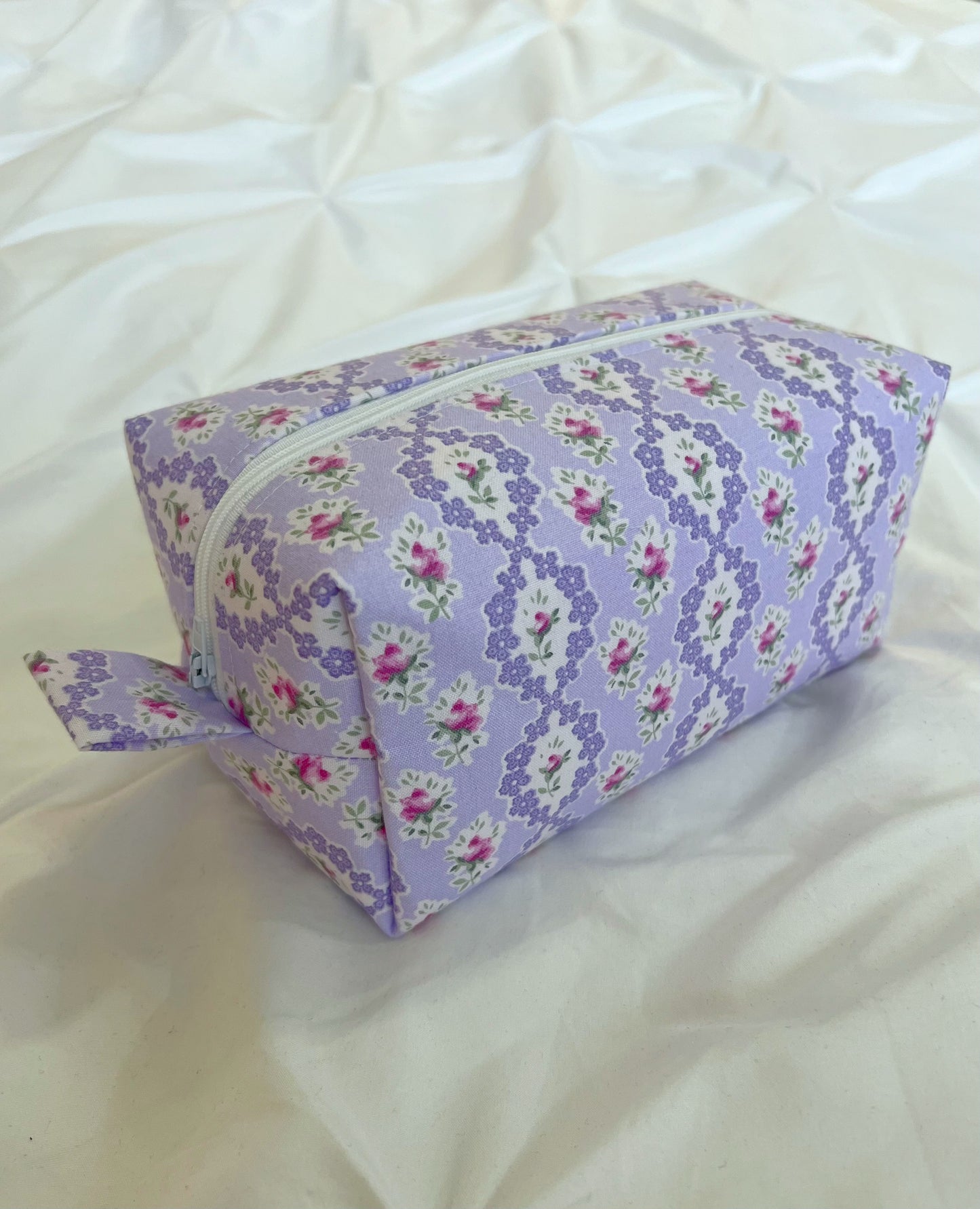 Purple floral coquette makeup bag