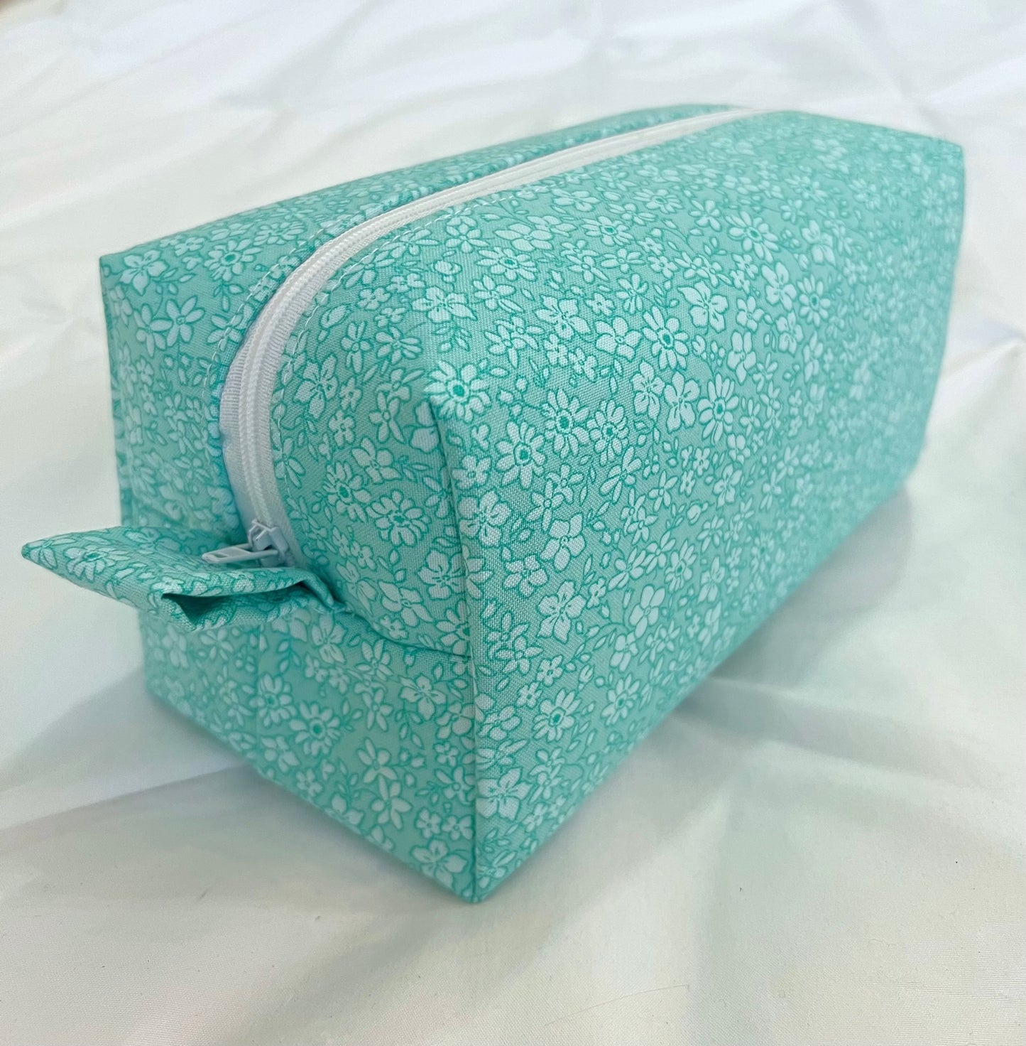 Teal floral makeup bag