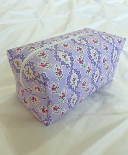 Purple floral coquette makeup bag