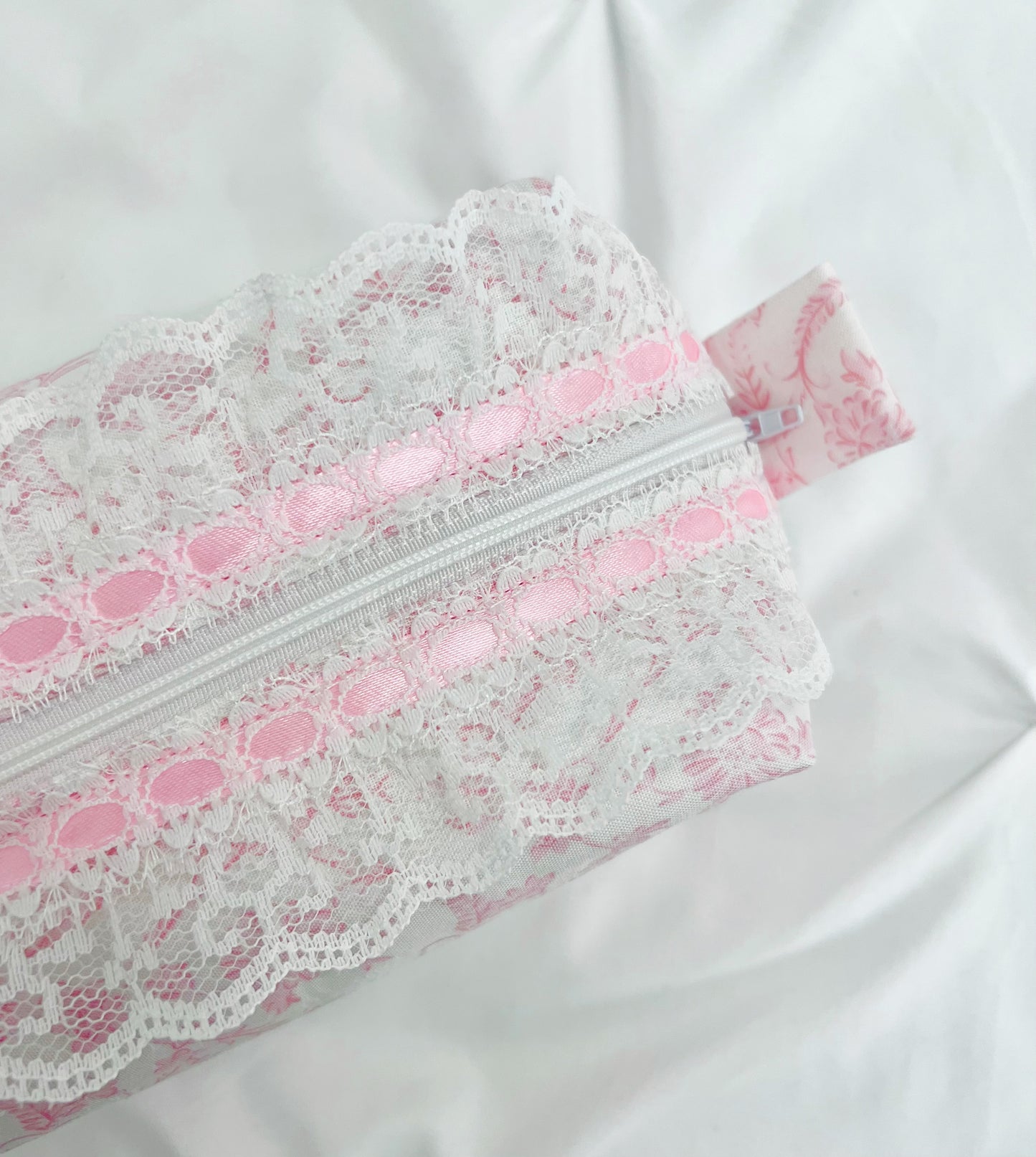 Pink toile makeup bag with white lace trim