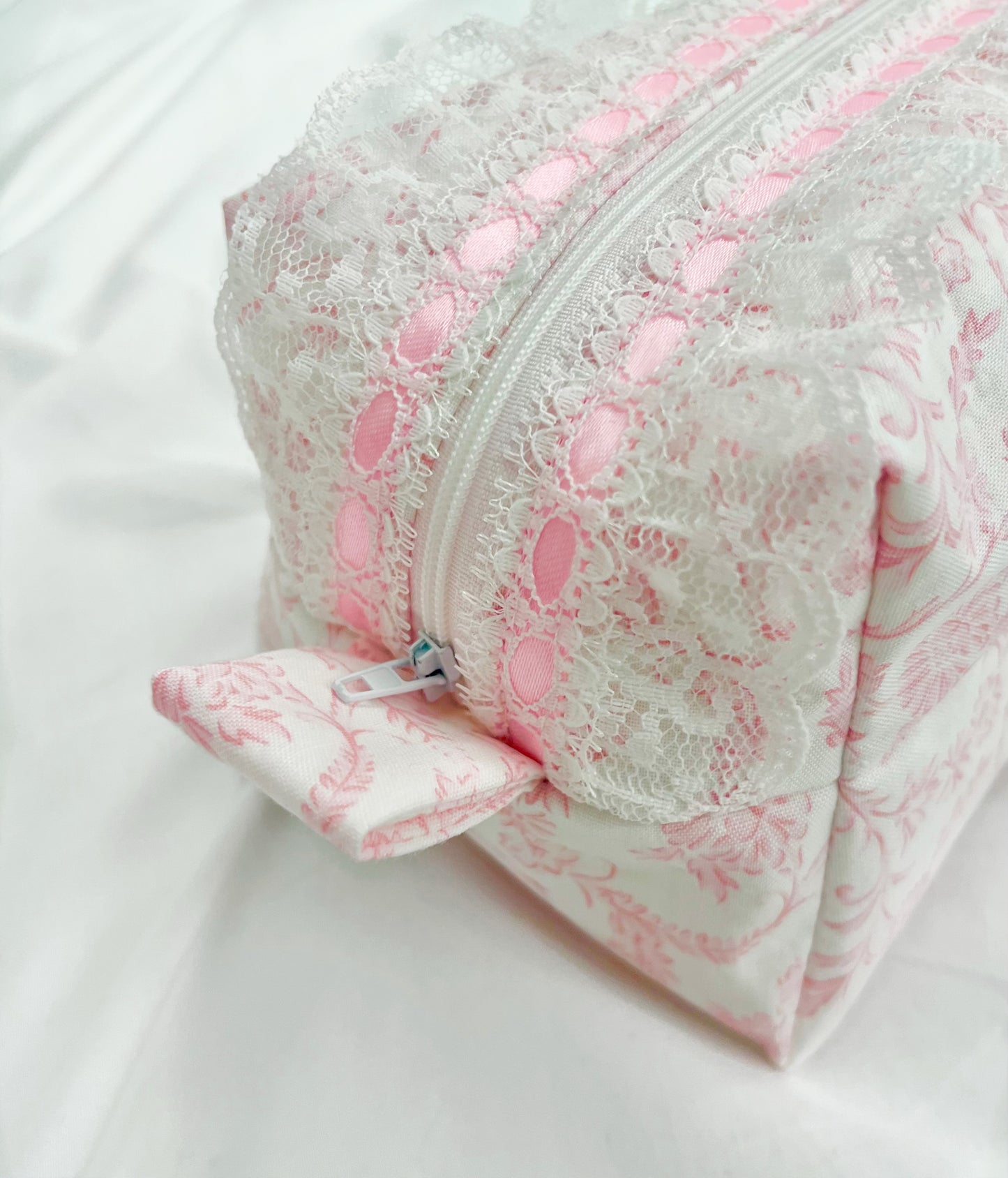 Pink toile makeup bag with white lace trim