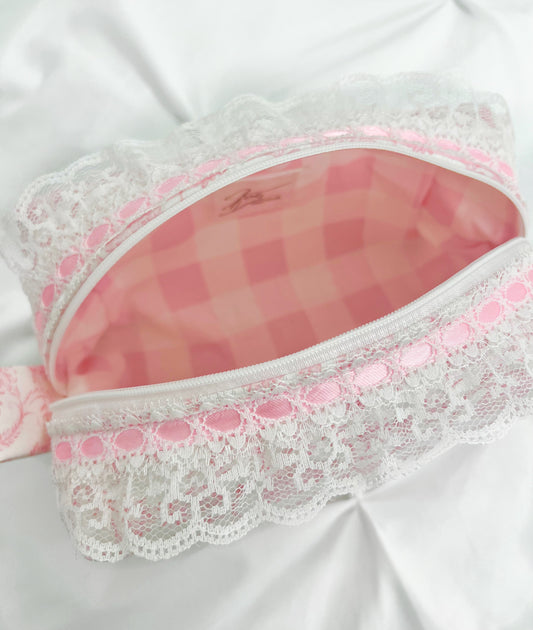 Pink toile makeup bag with white lace trim