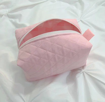 Pink quilted makeup bag