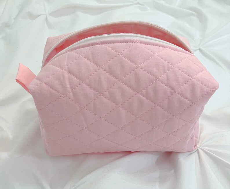 Pink quilted makeup bag