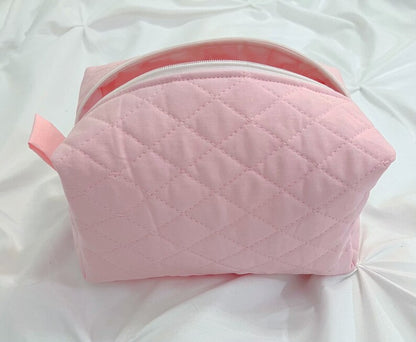 Pink quilted makeup bag